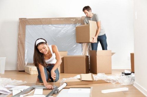 Removal van and moving boxes outside a typical Addiscombe home