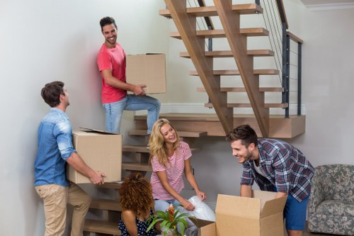 Removal van and packed boxes for a local move in Addiscombe