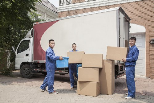Removal team planning a house move on a residential street in Addiscombe