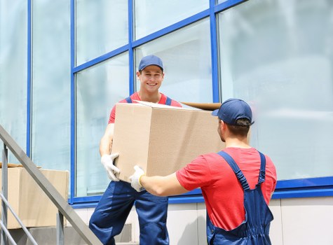 Packing supplies and labeled moving boxes for house removals