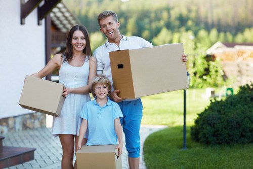 Packing and loading household items into a removals van