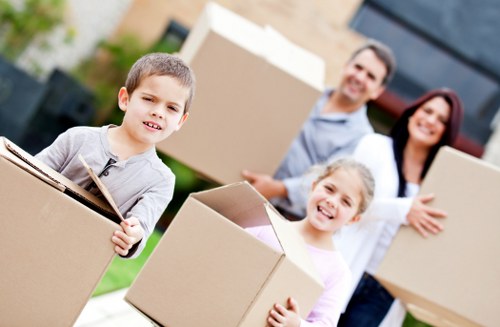 Staff coordinating a careful furniture move