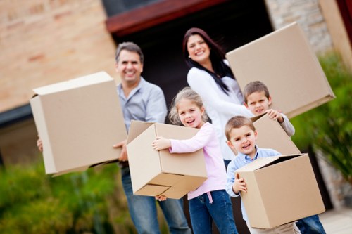 Unpacking boxes and arranging essentials in a new Addiscombe home