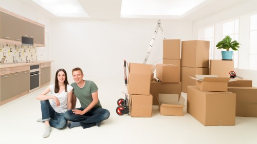 Boxes and furniture arranged for a house move in Addiscombe