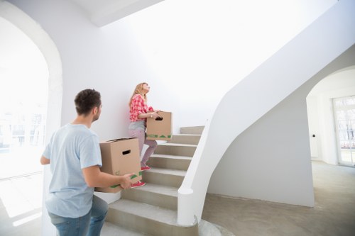 Careful loading of furniture and boxes into a moving van
