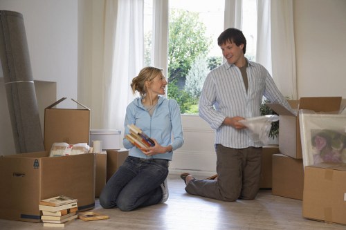 Careful loading of furniture and boxes into a moving van