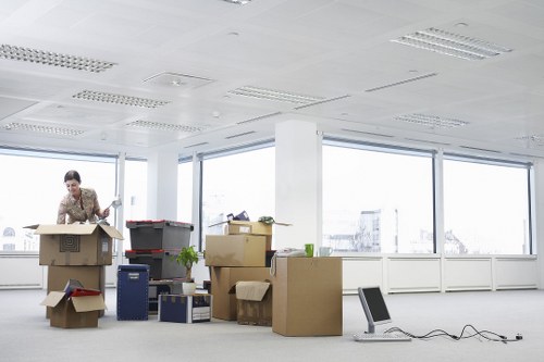 Professional movers handling office furniture in Addiscombe
